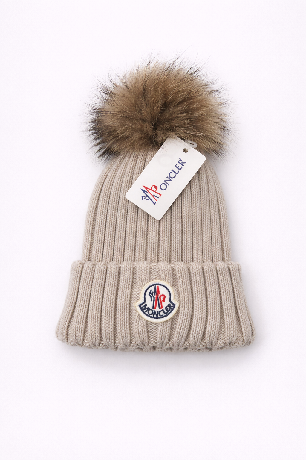 Moncler muts bont beige